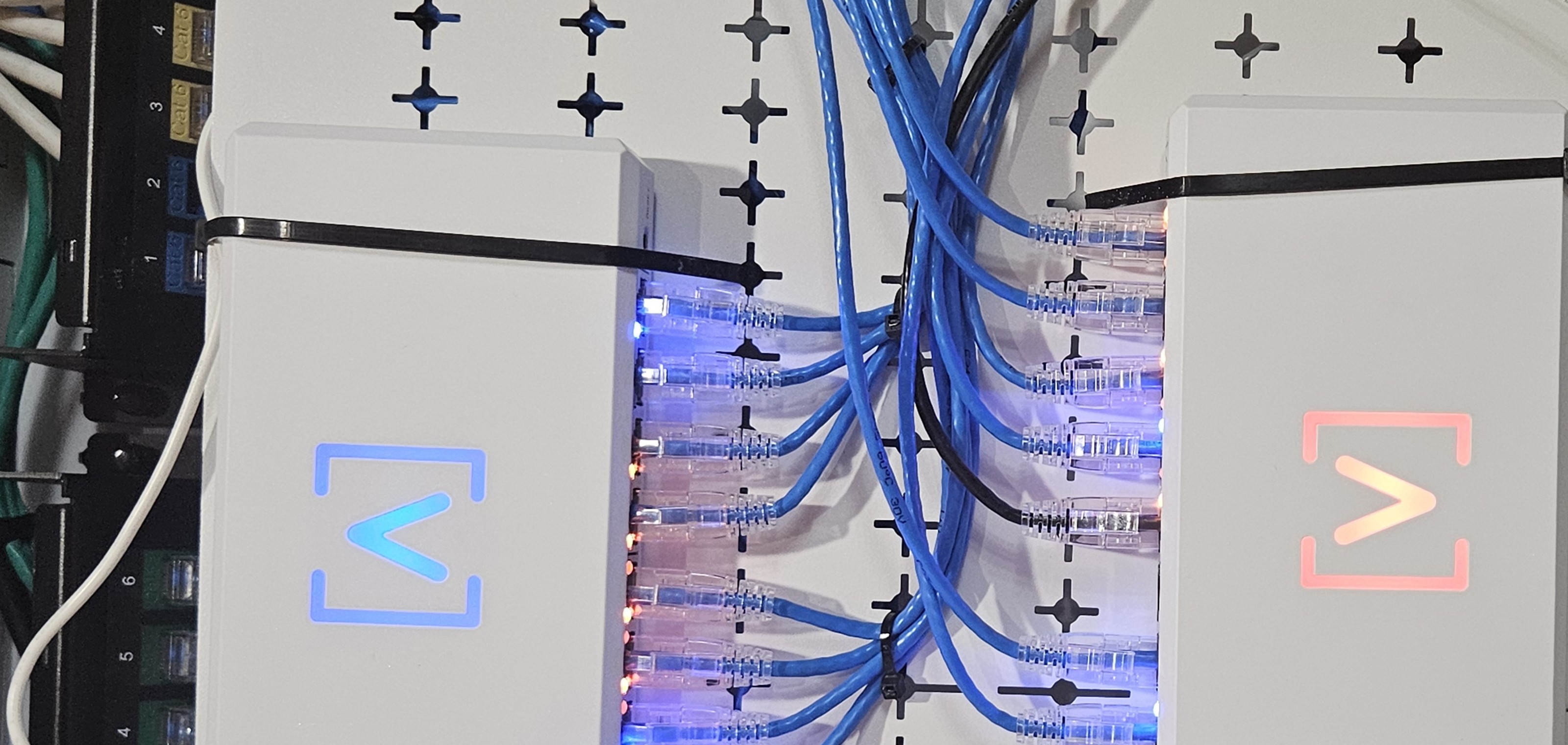 Installed Alta Labs networking equipment with organized cabling